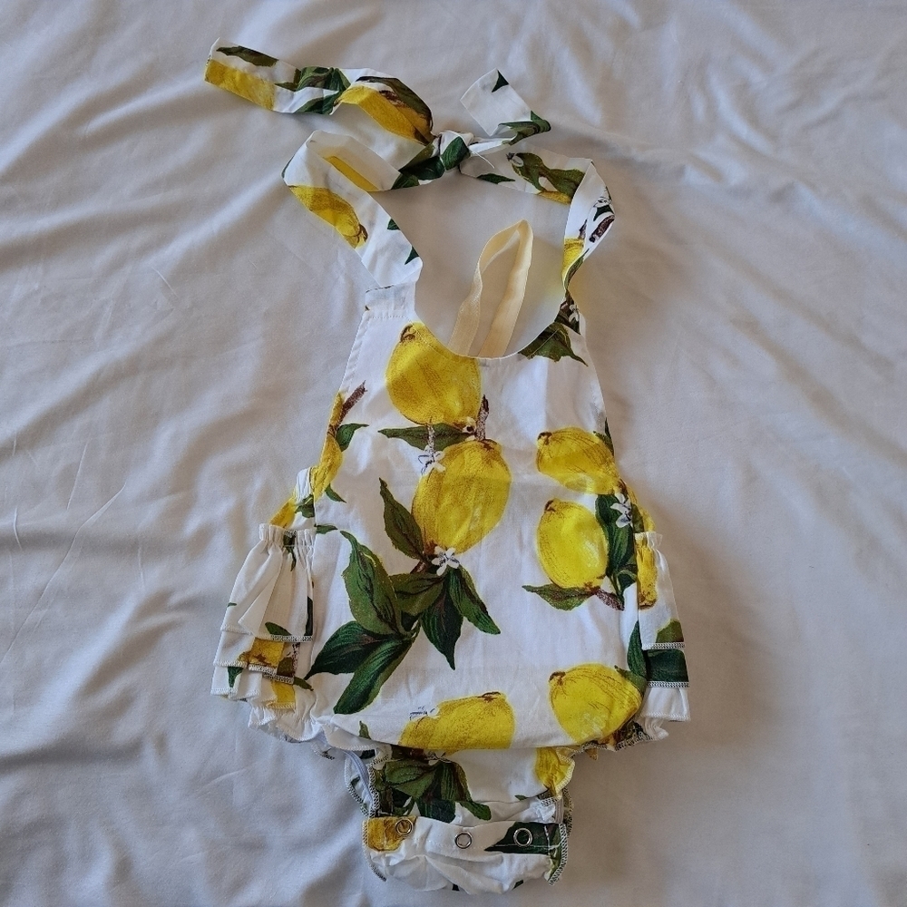 PrincesasA lemon romper with headband NWT size Small